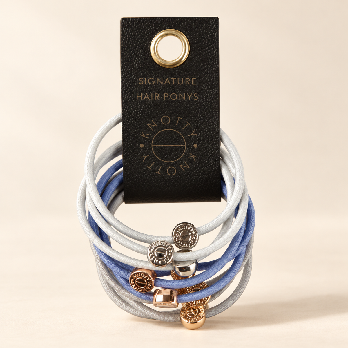 Knotty Denim set of ten hair elastics with metallic accents